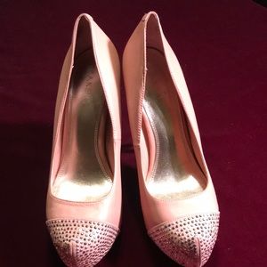 Peach colored gem toed high heeled bakers shoes